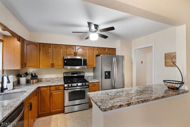 642 Succasunna Rd, Mount Arlington Boro, NJ 07850 - kitchen with appliances with stainless steel finishes, brown cabinets, and a sink