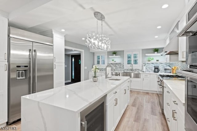 276 River Dr, River Vale Twp, NJ 07675 - kitchen featuring appliances with stainless steel finishes, open shelves, a sink, recessed lighting, and white cabinets