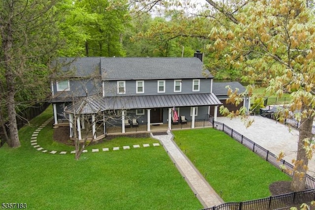 276 River Dr, River Vale Twp, NJ 07675 - view of front of home featuring a porch, metal roof, and a chimney