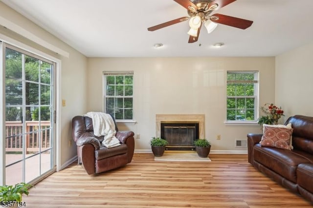 47 Nostrand Rd, Hillsborough Twp, NJ 08844 - living room featuring light wood-style flooring, plenty of natural light, and baseboards