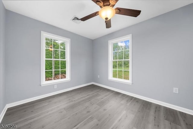56 Anthony Rd, Lebanon Twp, NJ 08826 - unfurnished room with healthy amount of natural light, wood finished floors, baseboards, and ceiling fan