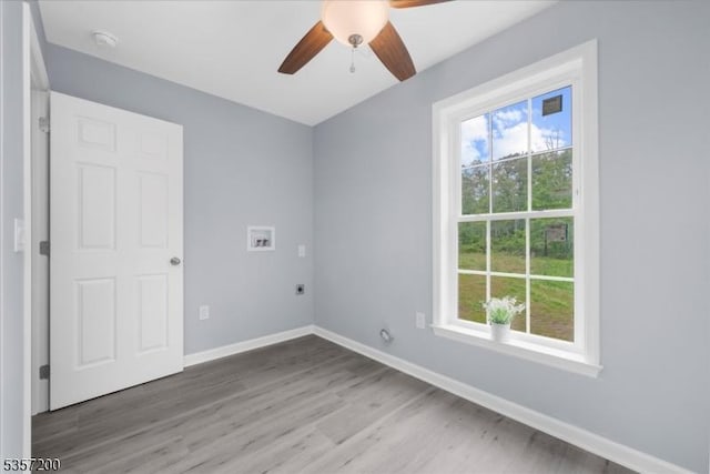 56 Anthony Rd, Lebanon Twp, NJ 08826 - empty room with plenty of natural light, a ceiling fan, wood finished floors, and baseboards