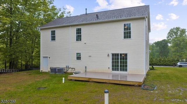 56 Anthony Rd, Lebanon Twp, NJ 08826 - rear view of property featuring a deck, central AC unit, and a yard