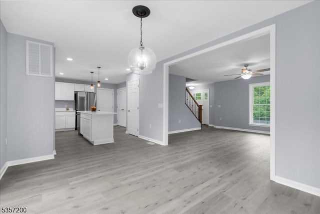 56 Anthony Rd, Lebanon Twp, NJ 08826 - unfurnished living room with baseboards, a ceiling fan, light wood-style flooring, and recessed lighting