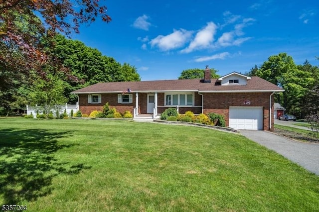 125 Flanders-Drakestown Rd, Mount Olive Twp, NJ 07836 - ranch-style home with brick siding, driveway, a front yard, a chimney, and a garage