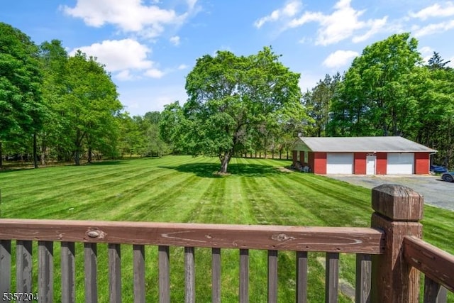 125 Flanders-Drakestown Rd, Mount Olive Twp, NJ 07836 - view of yard featuring a detached garage, driveway, an outdoor structure, and view of wooded area