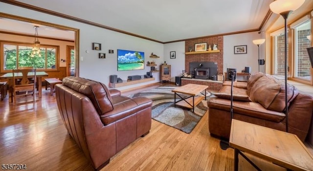 125 Flanders-Drakestown Rd, Mount Olive Twp, NJ 07836 - living area with light wood finished floors, ornamental molding, a wood stove, and a chandelier