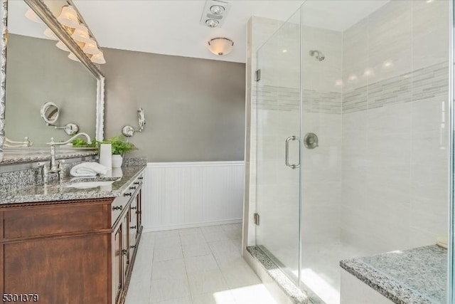 156 Fox Chase Rd, Chester Twp, NJ 07930 - bathroom with wainscoting, a shower stall, vanity, and tile patterned flooring