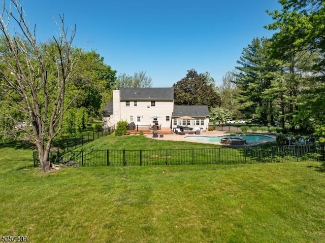 back of property featuring a patio