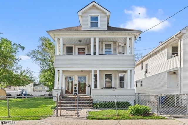 376 E 9th Ave, Roselle Boro, NJ 07203 - view of front of home featuring a balcony, covered porch, a gate, and french doors