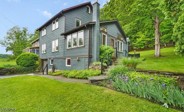 955 Stillwater Rd, Stillwater Twp, NJ 07860 - view of side of home featuring a lawn and a chimney
