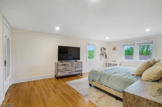 955 Stillwater Rd, Stillwater Twp, NJ 07860 - bedroom with radiator heating unit, wood finished floors, baseboards, and recessed lighting