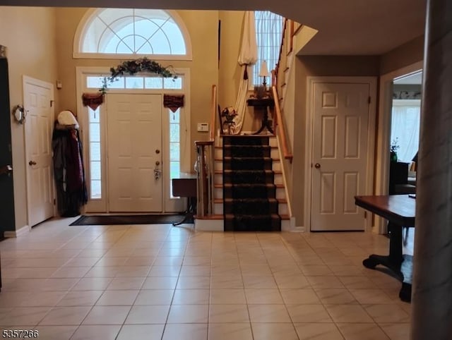 533 Horizon Way, Branchburg Twp, NJ 08853 - foyer with stairway, light tile patterned floors, and a high ceiling