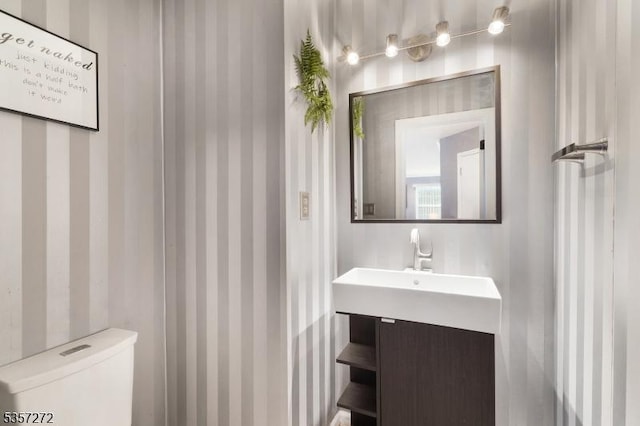4 Cickener Rd, Hillsborough Twp, NJ 08844 - half bathroom with wallpapered walls and toilet