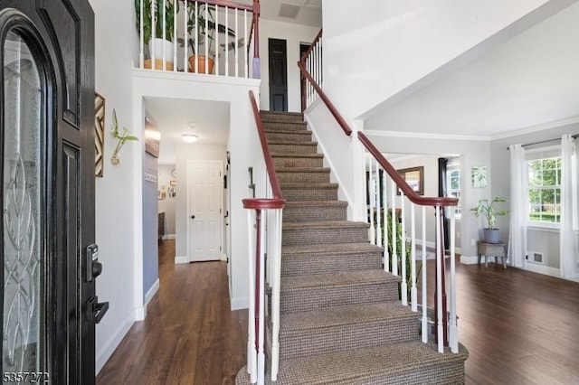 4 Cickener Rd, Hillsborough Twp, NJ 08844 - entrance foyer with wood finished floors, stairway, and ornamental molding