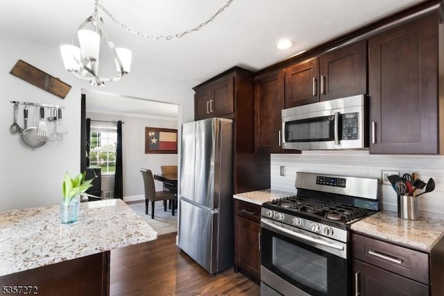 4 Cickener Rd, Hillsborough Twp, NJ 08844 - kitchen with appliances with stainless steel finishes, a chandelier, decorative backsplash, dark brown cabinetry, and dark wood finished floors