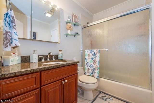 full bath with crown molding, toilet, vanity, shower / bath combination with glass door, and tile patterned floors