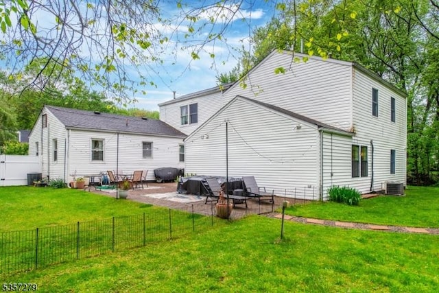 back of property with a patio and cooling unit