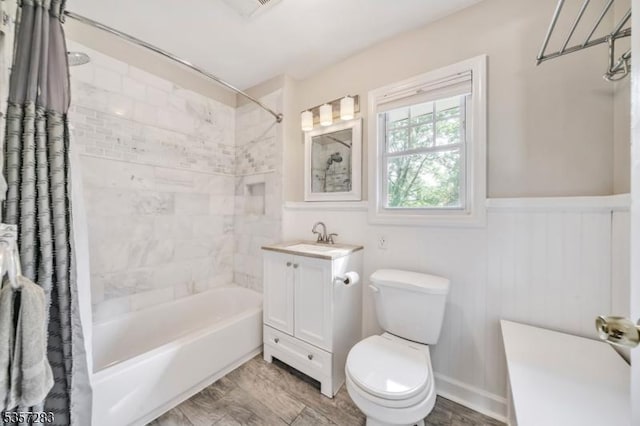 188 Watchung Ter, Scotch Plains Twp, NJ 07076 - bathroom featuring shower / bath combo, vanity, and a wainscoted wall
