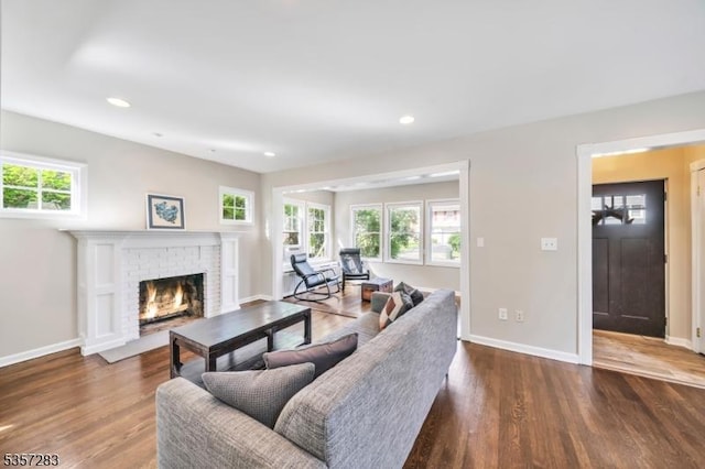 188 Watchung Ter, Scotch Plains Twp, NJ 07076 - living room featuring a brick fireplace, wood finished floors, and recessed lighting