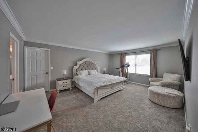 carpeted bedroom with crown molding and baseboards