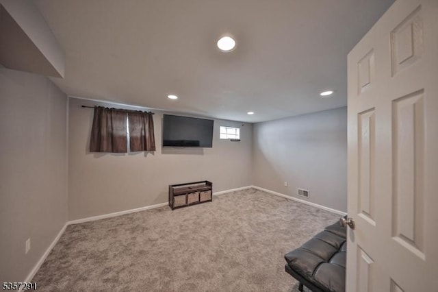 basement with recessed lighting, carpet flooring, and baseboards