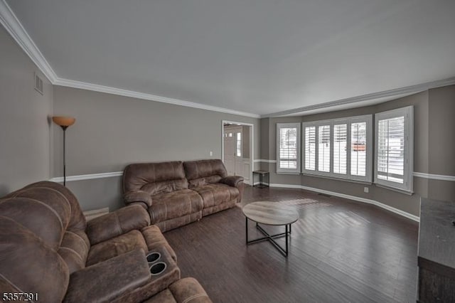 living area featuring ornamental molding, baseboards, and dark wood finished floors