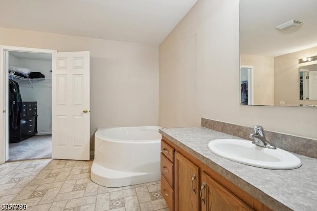 902 Sprout Hill Rd, Hampton Twp, NJ 07860 - full bath with a garden tub, vanity, and a walk in closet