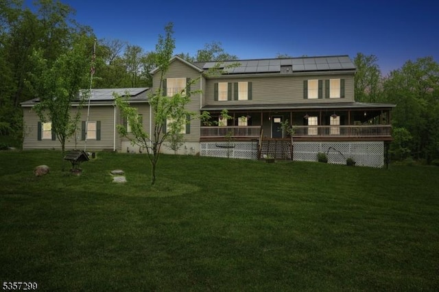 902 Sprout Hill Rd, Hampton Twp, NJ 07860 - rear view of house with solar panels, a yard, and a porch