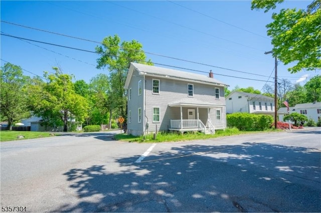 571 Main St, Union Twp, NJ 08802 - view of front of property featuring uncovered parking and covered porch