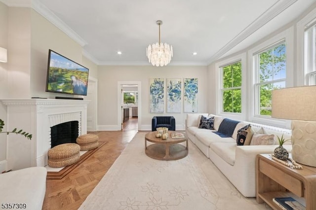 living room with ornamental molding, recessed lighting, baseboards, a chandelier, and a brick fireplace