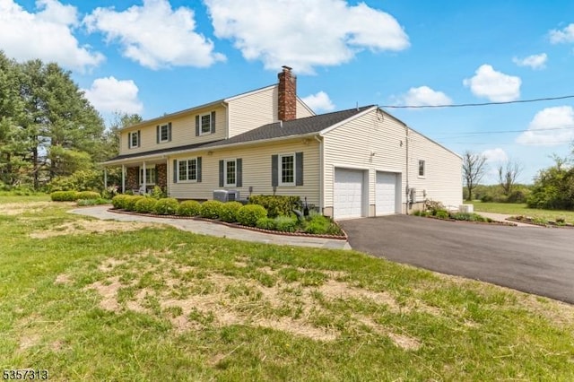 1602 Harbourton Rocktown Rd, Hopewell Twp, NJ 08530 - view of front of house featuring an attached garage, driveway, and a chimney