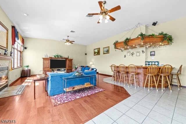 1602 Harbourton Rocktown Rd, Hopewell Twp, NJ 08530 - living room with ceiling fan, a dry bar, baseboards, and wood finished floors