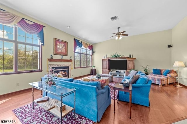 1602 Harbourton Rocktown Rd, Hopewell Twp, NJ 08530 - living room featuring ceiling fan, wood finished floors, a glass covered fireplace, and baseboards