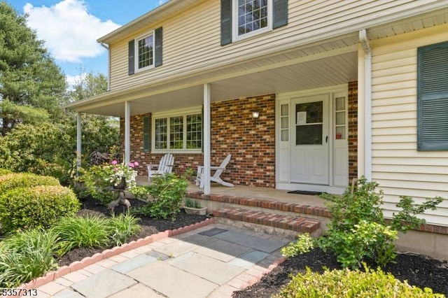 1602 Harbourton Rocktown Rd, Hopewell Twp, NJ 08530 - property entrance featuring a porch and brick siding
