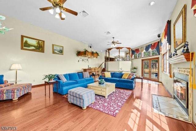 1602 Harbourton Rocktown Rd, Hopewell Twp, NJ 08530 - living room with a ceiling fan, light wood finished floors, a tiled fireplace, baseboards, and recessed lighting