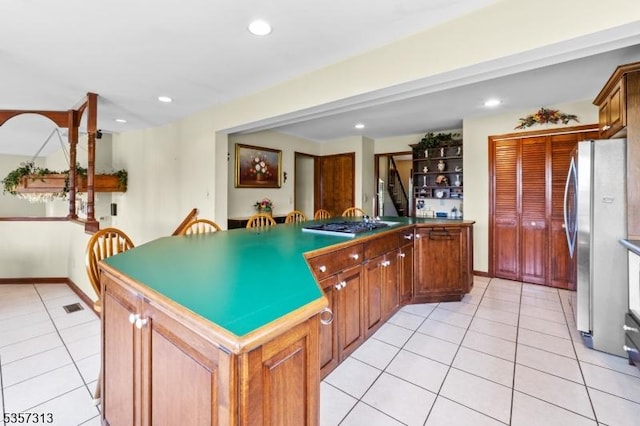 1602 Harbourton Rocktown Rd, Hopewell Twp, NJ 08530 - kitchen featuring stainless steel appliances, light tile patterned floors, a kitchen island, recessed lighting, and baseboards