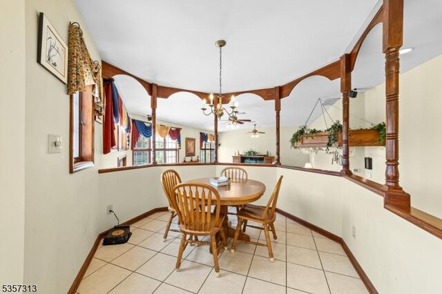 1602 Harbourton Rocktown Rd, Hopewell Twp, NJ 08530 - dining area with a chandelier, light tile patterned floors, and baseboards
