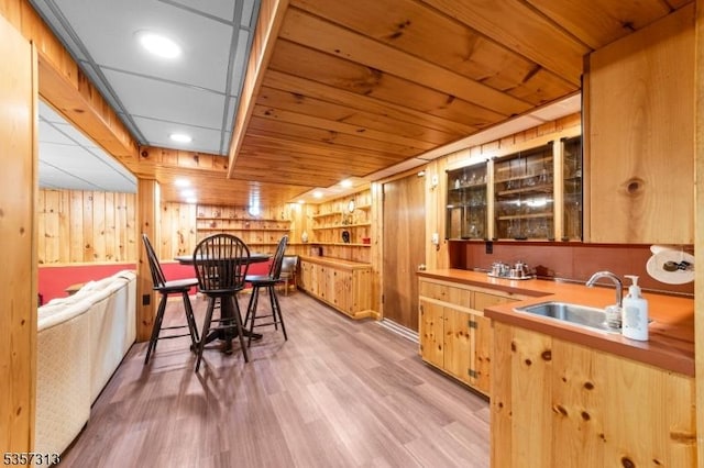 1602 Harbourton Rocktown Rd, Hopewell Twp, NJ 08530 - dining space featuring wet bar, light wood finished floors, wooden walls, and recessed lighting