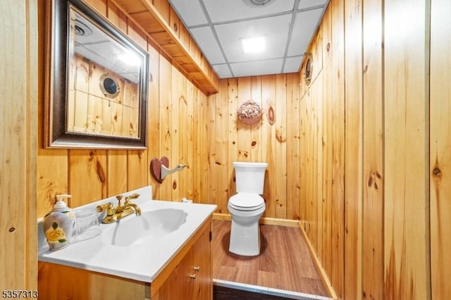 1602 Harbourton Rocktown Rd, Hopewell Twp, NJ 08530 - bathroom featuring vanity, toilet, wood finished floors, wooden walls, and a paneled ceiling