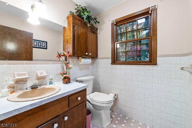 1602 Harbourton Rocktown Rd, Hopewell Twp, NJ 08530 - bathroom with tile walls, vanity, toilet, tile patterned flooring, and a wainscoted wall