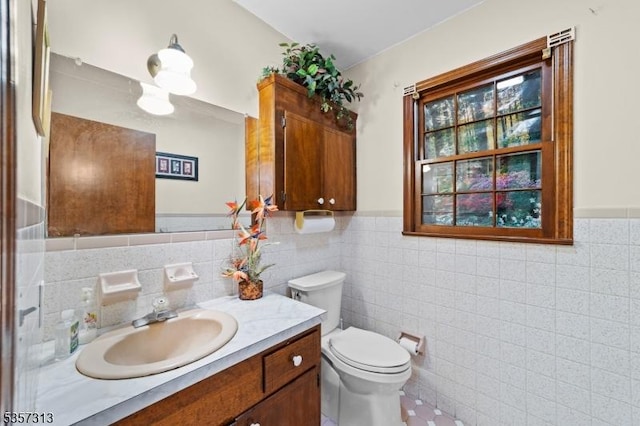 1602 Harbourton Rocktown Rd, Hopewell Twp, NJ 08530 - half bathroom with tile walls, vanity, toilet, and a wainscoted wall