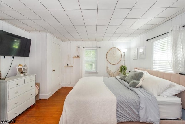 bedroom with wood finished floors