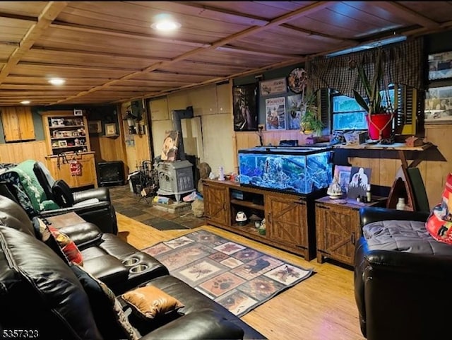 128 Upper High Crest Dr, West Milford Twp, NJ 07480 - living room with wood finished floors, wooden walls, a wood stove, wooden ceiling, and recessed lighting