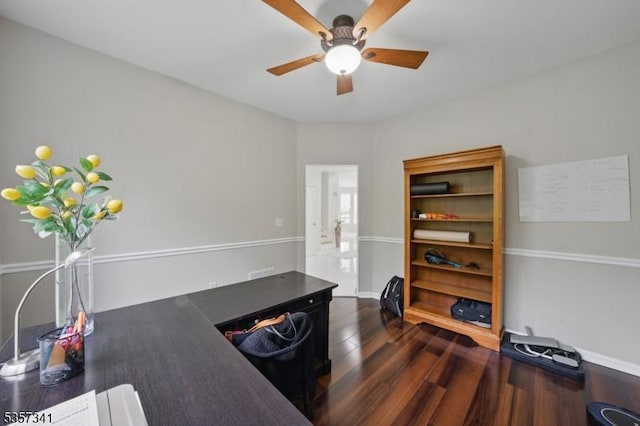 office with ceiling fan, dark wood-style floors, and baseboards