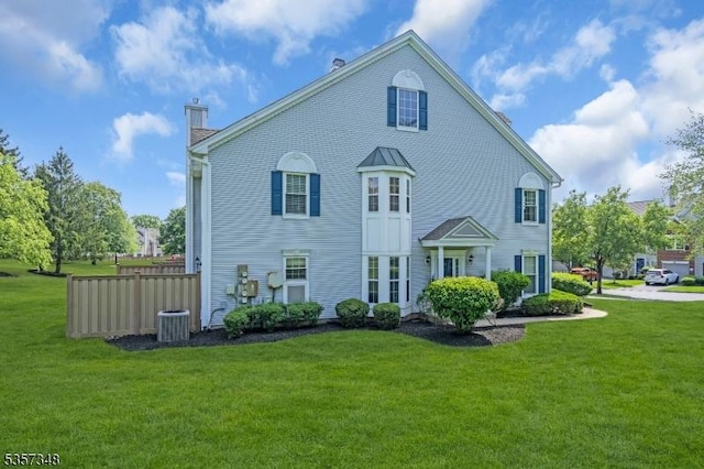 1901 Stech Dr, Bridgewater Twp, NJ 08807 - rear view of house featuring a chimney and cooling unit