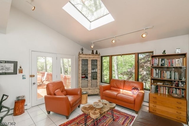 23 Horizon Dr, Roxbury Twp, NJ 07876 - living room featuring track lighting, light tile patterned floors, a skylight, and lofted ceiling