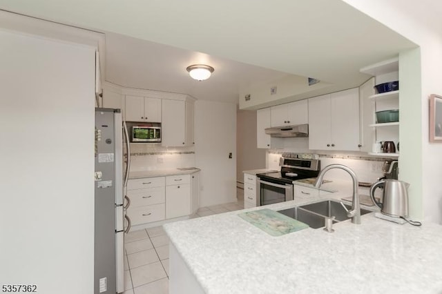 23 Horizon Dr, Roxbury Twp, NJ 07876 - kitchen with stainless steel appliances, under cabinet range hood, a sink, decorative backsplash, and open shelves