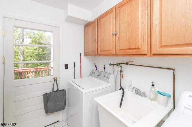 23 Horizon Dr, Roxbury Twp, NJ 07876 - clothes washing area featuring washer / clothes dryer and cabinet space