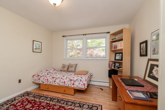 23 Horizon Dr, Roxbury Twp, NJ 07876 - bedroom featuring a baseboard radiator, light wood-style floors, an office area, and baseboards